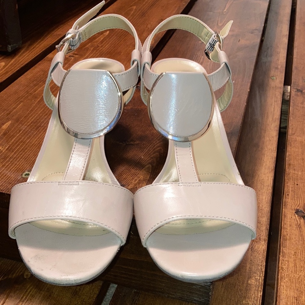Light pinkish, cream color. Wedged heels for women